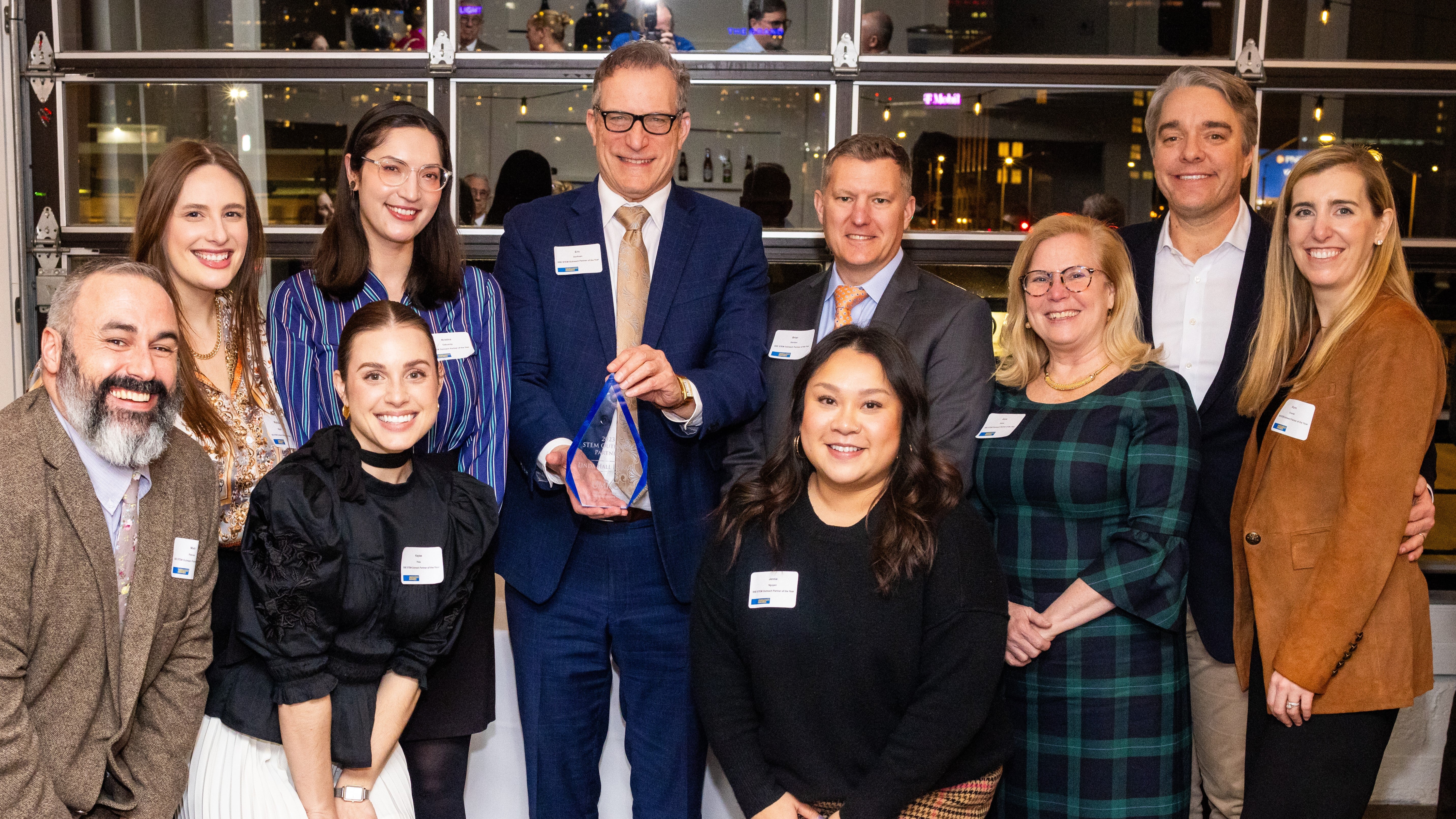 Linda Hall Library team accepting 2023 STEM Outreach Partner of the Year award from UMKC