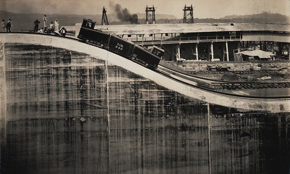 Testing a prototype towing locomotive.
Electric-powered locomotive “mules” have towed ships through the locks since its opening in 1914. The original locomotives were 32-feet long, 8-feet wide, and weighed 42 tons. The locomotives operated on 5-foot Panama Railroad gauge running parallel to the Canal.  