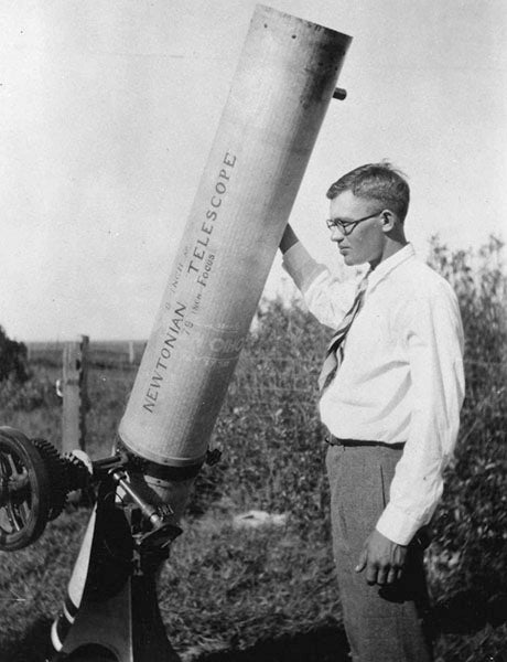 Clyde Tombaugh, photograph, 1930, with a small telescope, not the one used to discover Pluto (Wikimedia commons)
