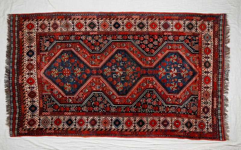 The Qashqa'i Shekarlu wool carpet that covered Freud’s couch in Vienna, and still covers it today, in the Freud Museum, London (freud.org.uk)
