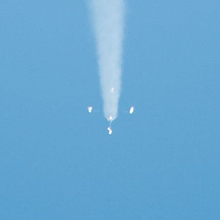 The “Korolev Cross,” formed when the four booster rockets of the R-7 fall away after launch (Wikimedia commons)