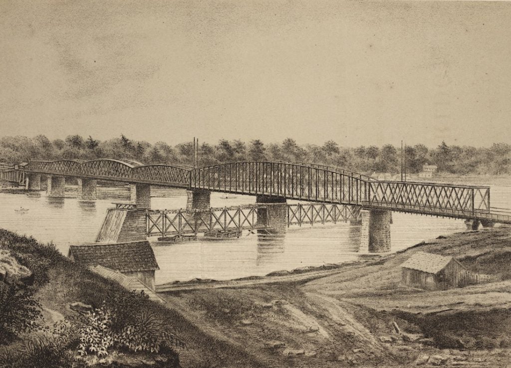 The Hannibal Bridge, designed by Octave Chanute, opened in 1869 in Kansas City, becoming the first bridge across the Missouri River. The bridge turned Kansas City in a transportation hub, connecting the city to the larger network of rail lines. A new bridge replaced the Chanute-designed structure in 1916 and remains in use today. Image source: Chanute, Octave