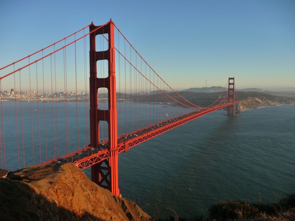 The Golden Gate Bridge, looking south, towers in shadow (blomberg.com)