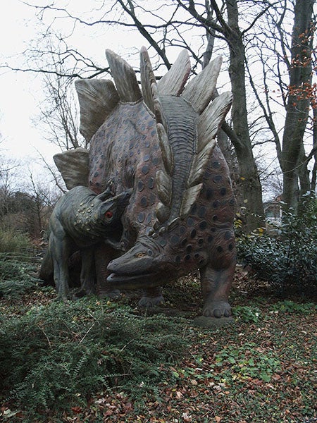 Stegosaurus attacked by Ceratosaurus, sculpture by Josef Pallenberg at Tierpark Hagenbeck, Hamburg, recent photograph (Wikimedia commons)