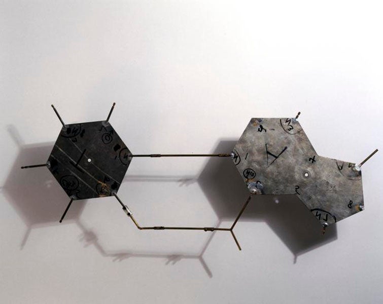 Two of the original aluminum plates used to model the bases in the Watson-Crick model of 1953; here thymine and adenine make up one base-pair, Science Museum, London (collection.sciencemuseumgroup.org.uk)