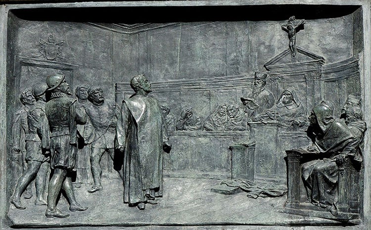 Plaque on the base of the statue of Bruno, showing him defiant before the Inquisition, sculpted by Ettore Ferrari, Campo de’ Fiori, Rome, 1889 (Wikimedia commons)