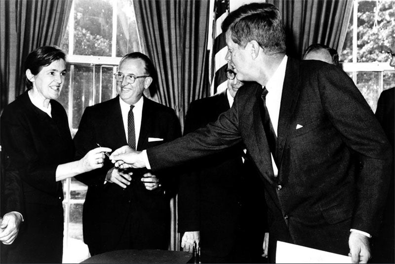 Frances Oldham Kelsey, at far left, receiving a pen from President Kennedy after the signing of the Kefauver-Harris Drug Amendments, Oct. 10, 1962 (FDA on flickr).