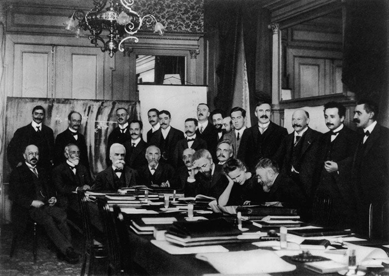 Group portrait of the first Solvay Conference in Brussels, 1911; Henri Poincare is seated at right, talking with the only woman present, Marie Curie. (Wikimedia commons)