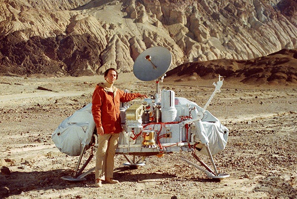 Carl Sagan with a model of the Viking lander in Death Valley (NASA)
