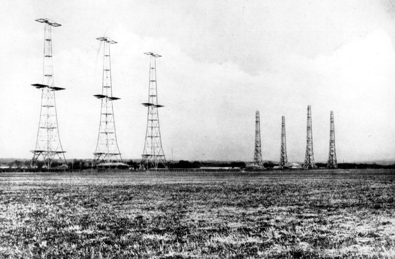 Chain Home installation at RAF Poling in Sussex; the three steel towers at left are transmitters, the wooden towers at right are the receivers (rafsmuseum.org)