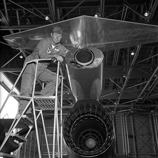 Chuck Yeager at the tail end of a Lockheed F-104 Starfighter, photograph, 1963 (Wikimedia commons)