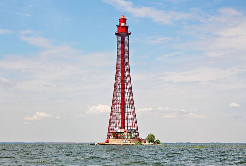 Rear Adziogol Lighthouse, designed and built by Vladimir Shukhov, 1911, Dnieper Estuary, Ukraine; recent photograph, but before 2022 (birdinflight.com)