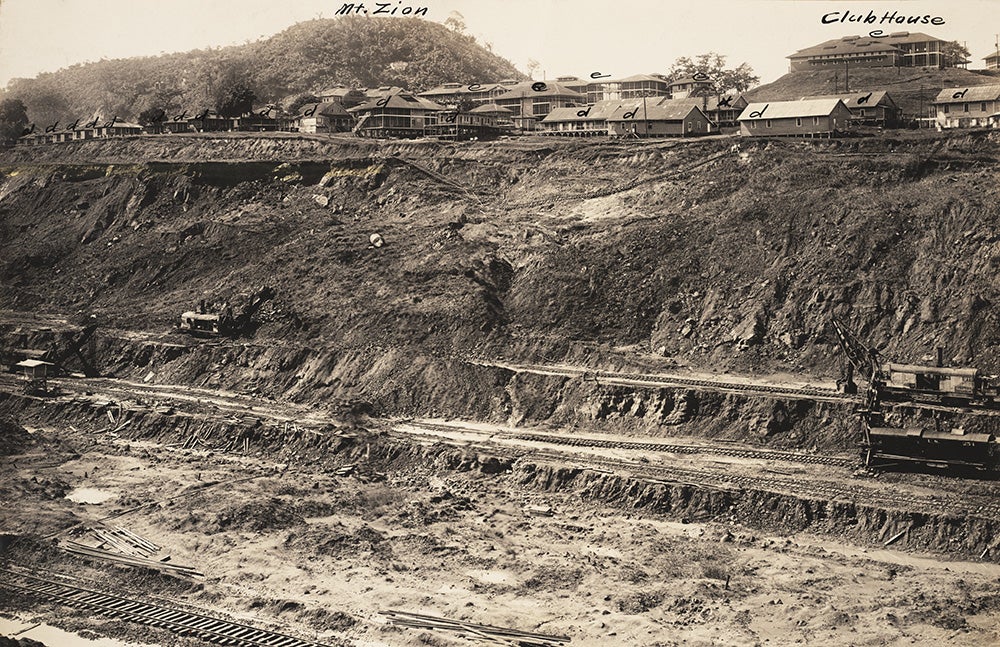 Buildings at the town of Culebra threatened by slide.
 In January 1910, the buildings marked “d” along Steam Shovel Row in Culebra were close to sliding into the Cut. In November, they were dismantled and moved. One year later in January 1911, the slide had crept as far as the buildings marked   “e,” which were also dismantled and moved. Eventually 75 acres of the town slid into the Cut. View in Digital Collection »