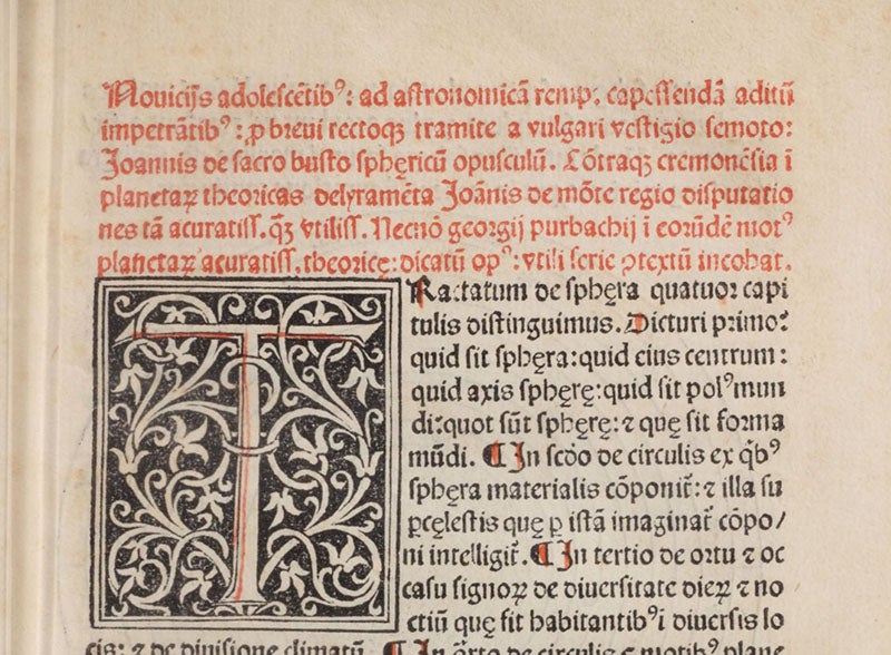 First paragraph and initial letter, printed in red and black, listing Sacrobosco, Regiomontanus, and Peurbach among the authors included, Sphaera mundi, by Johannes de Sacobosco, 1482 (Linda Hall Library)