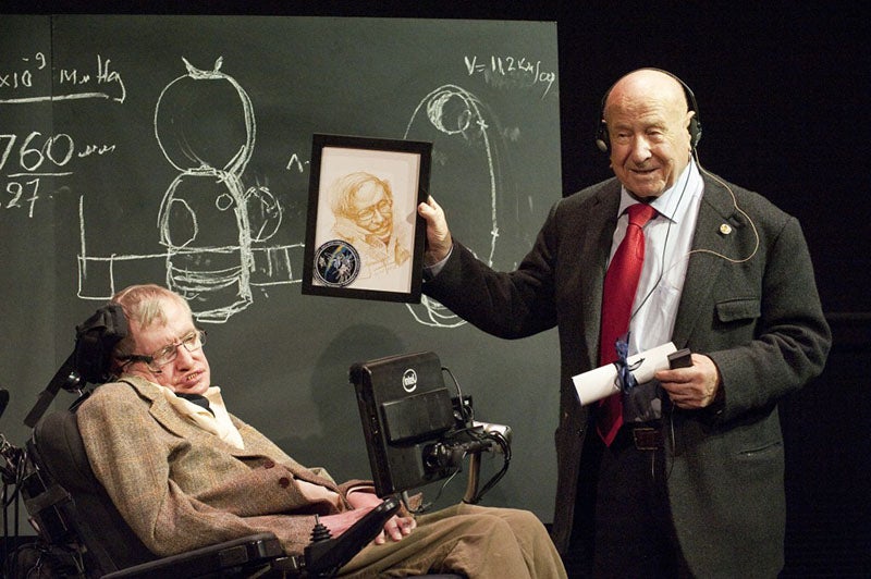 Alexei Leonov presenting Stephen Hawking with a portrait sketch that Leonov drew, on a visit to the Science Museum, London, 2015 (blog.sciencemuseum.org.uk)