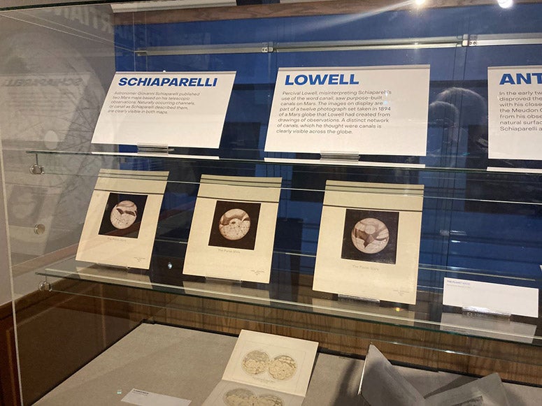 One case in the exhibition, Life Beyond Earth, at the Linda Hall Library, showing three of Percival Lowell’s photographs of his Martian globe (photo by the author)