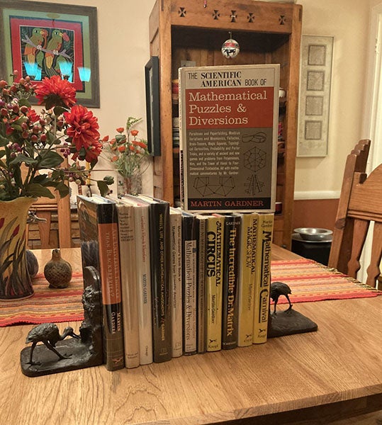 Author’s collection of books on mathematical games by Martin Gardner, with his first collection (1959) standing on top (photo by the author)