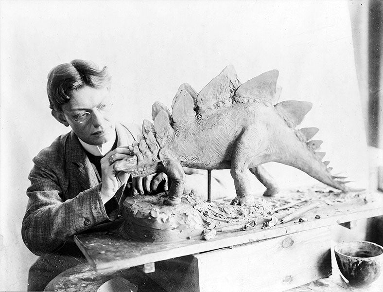 Charles R. Knight sculpting a Stegosaurus, photograph, 1899, American Museum of Natural History (Wikimedia commons)