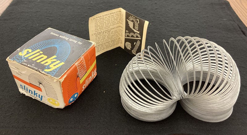 An early Slinky (1960s?) with its original box and instructions (author’s collection)