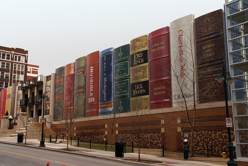 Right half of the giant community bookshelf on the exterior of the Kansas City Public Library Parking Garage; the spine of the book at far right, Romeo and Juliet, was taken from the spine of vol. 4 of Ferns: British and Exotic, by Edward Joseph Lowe (theclio.com)
