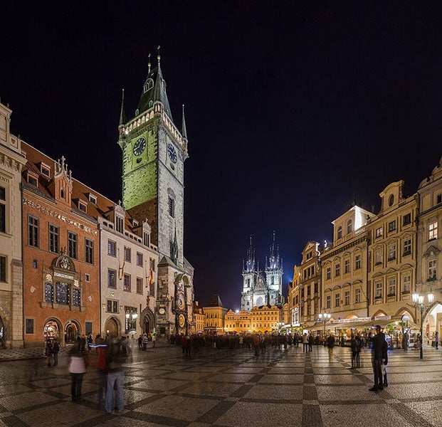 Panorama of Prague Old Town Square, with Astronomical Clock just left of center and Church of Our Lady before Týn in the background, Czech Republic, photograph by David Iliff, 2010 (Wikimedia commons)