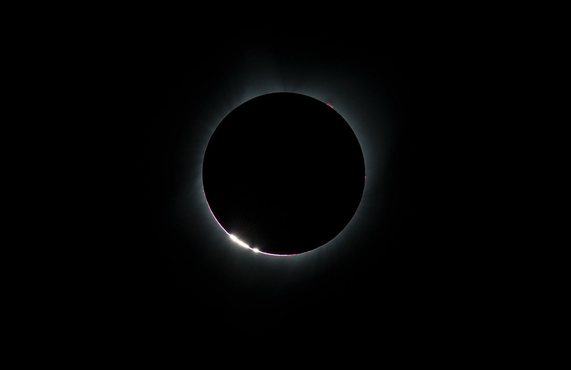 Baily’s beads as seen during a solar eclipse, photograph (NASA/Aubrey Gemignani)