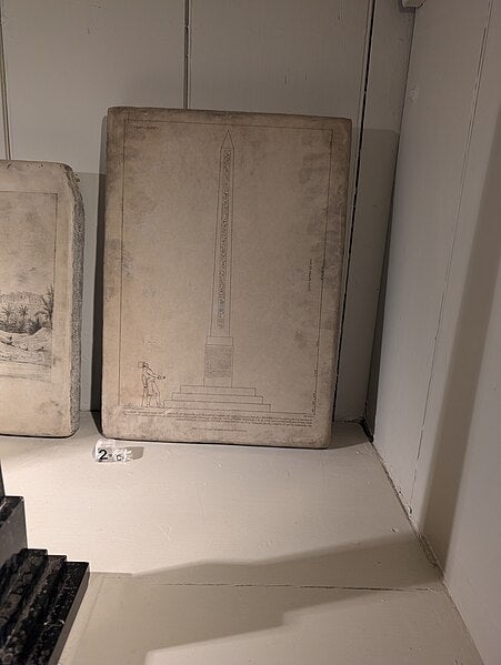 A lithographic stone at Kingson Lacy, depicting one face of the Philae obelisk (Wikimedia commons)