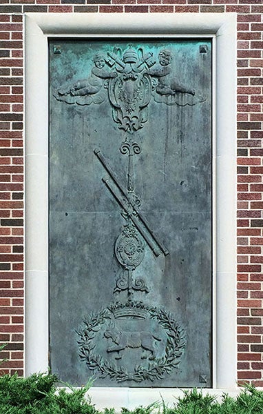 Bronze panel no. 3, based on two elements from the engraved title page, Il Saggiatore (Assayer), by Galileo Galilei, 1623, with two of Galileo’s telescopes added; cast by Bruno Bearzi, 1967, west exterior annex wall, Linda Hall Library