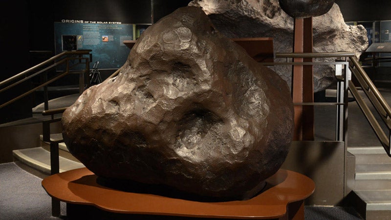 “The Woman” on display in the American Museum of Natural History, recent photograph; note the marks of hammerstones that were used by the Inuit over thousands of years to remove small chunks of iron for their tools (amnh.org)
