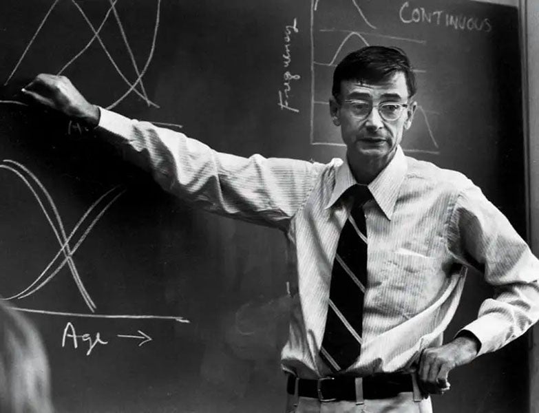 E. O. Wilson at the blackboard, photograph, ca 1975, New Scientist (newscientist.com)