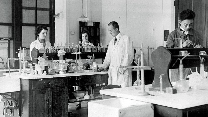Laboratory at the Radium Institute, Paris, photograph, 1930.  Marguerite Perey is the woman on the right in the back (New York Times)
