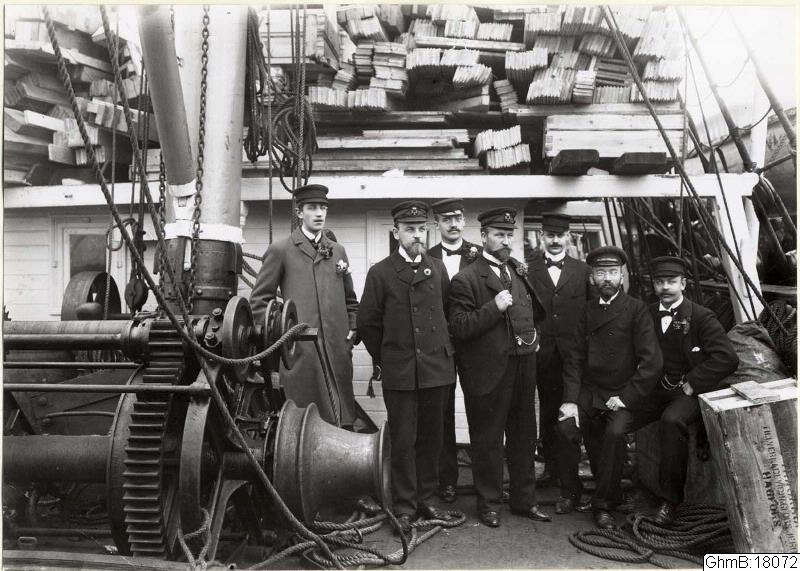 The scientific crew of the Swedish South-polar Expedition aboard the <i>Antarctic</i>; Otto Nordenskjöld is in the front, second from the left; photograph, 1901 (Wikimedia commons)