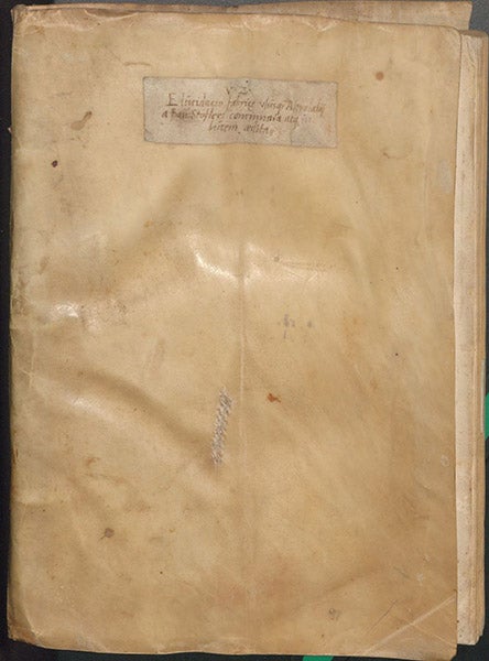 Limp vellum front cover with pasted-on title-slip, Elucidatio fabricae vsusq[ue] astrolabii, by Johannes Stöffler, 1513 (Linda Hall Library)