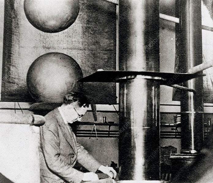 Ernest Walton with two of the rectifiers for the Cockcroft-Walton generator, Cavendish Lab, Cambridge, ca 1931 (rinconducativo.org)