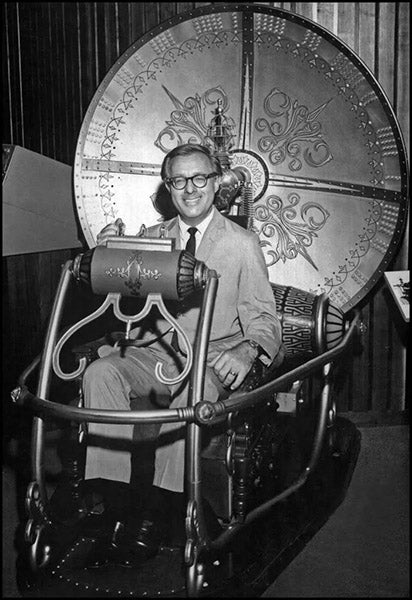 Ray Bradbury, sitting in the restored time machine in the collection of Bob Burns III (i.kinja-img.com)