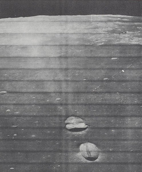 An oblique view of the craters Messier and Messier A, in Mare Fecunditatis, photograph by Lunar Orbiter 5, from The Moon as Viewed by Lunar Orbiter 2, by L.J. Kosofsky and Farouk El-Baz, NASA SP-200, 1970 (Linda Hall Library)