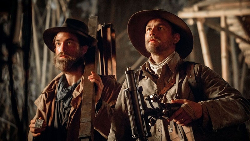 Percy Fawcett, played by Charlie Hunnam (right), with Henry Costin, who accompanied Fawcett on many expeditions, but not the last one, played by Robert Pattinson, still from the film, The Lost City of Z, directed by James Gray, 2016 (newyorker.com)