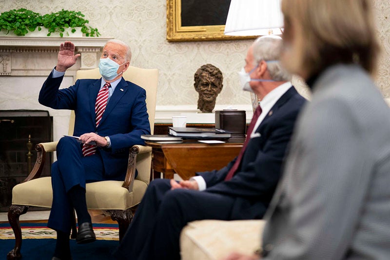 President Biden in the White House, Feb. 2021, with a sculpture of Robert Kennedy, by Robert Berks, on the side table, New York Times (www.nytimes.com)