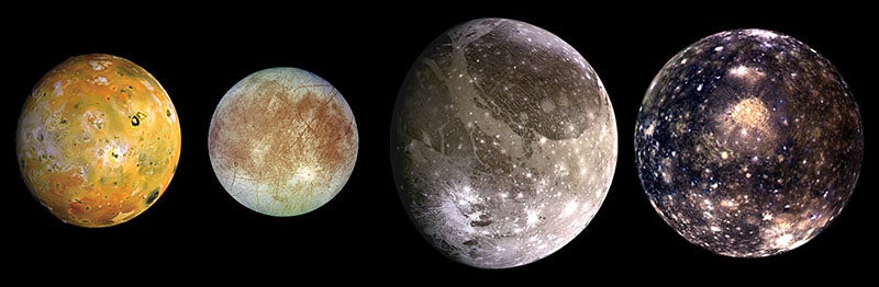 The four Galilean moons of Jupiter, mosaic of four photographs taken by the Galileo spacecraft, 1996-1997; from left they are: Io, Europa, Ganymede, Callisto (Wikimedia commons)