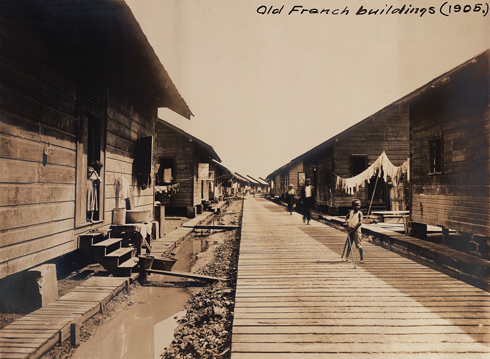 Housing for unskilled laborers in Cristóbal.
Housing provided for unskilled workers by the I.C.C. was rudimentary, at best, and windows often were not equipped with screens. Native and West Indian laborers were assumed to be immune to yellow fever and malaria, but, though many natives were immune to yellow fever, malaria could disable thousands of workers for weeks at a time.
View in Digital Collection »