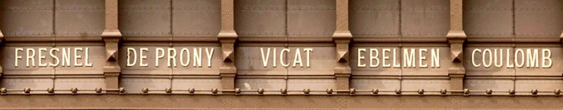 Detail of the name frieze on the southeast side of the Eiffel Tower, showing the name of Louis Vicat, erected 1889 (Wikimedia commons)