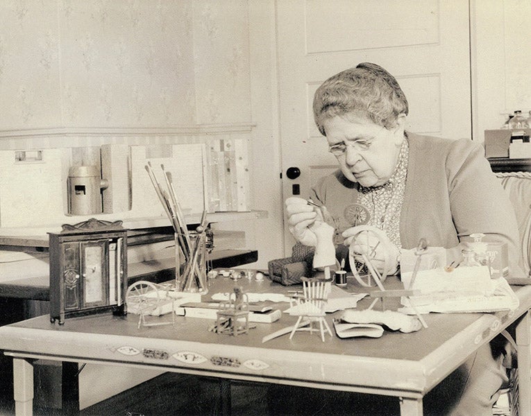 Frances Glessner Lee at work on one of the Nutshell dioramas in her home workshop, undated photograph, but ca 1944, Glessner House Museum, Chicago (americanart.si.edu)