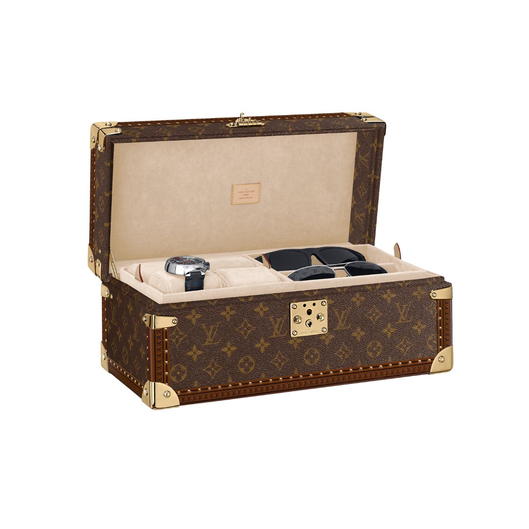 Louis Vuitton monogram suitcase trunk open by center, square handle.