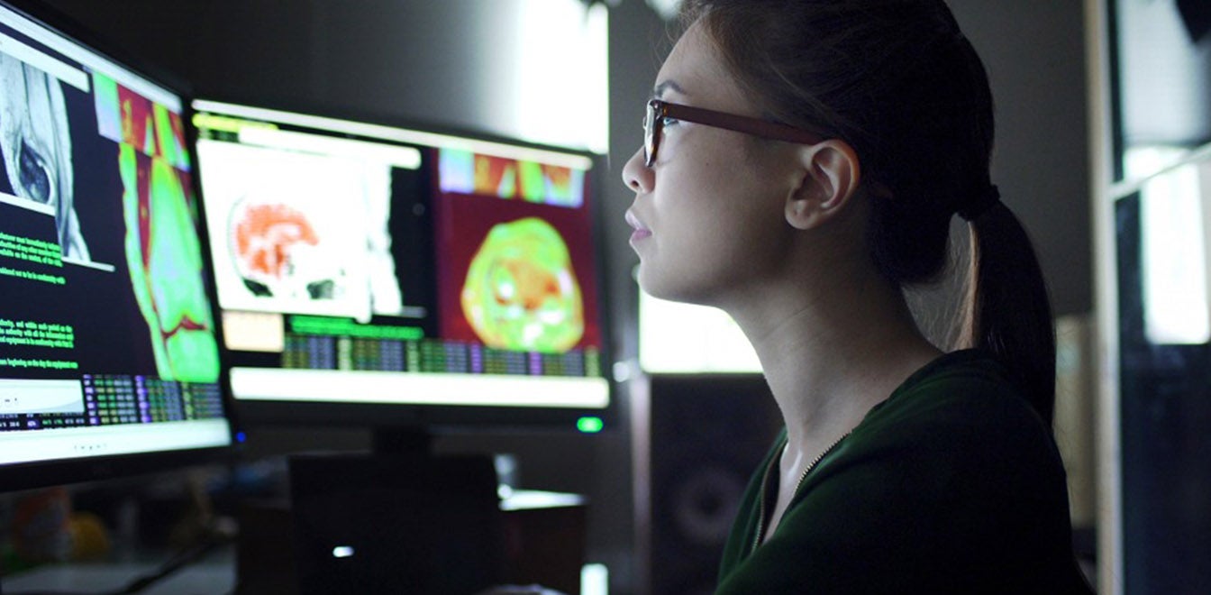Woman watching physiology screens
