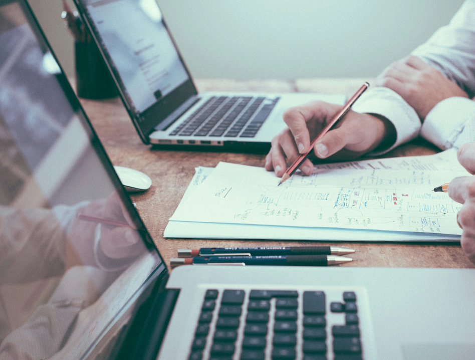 People working near their laptops. 