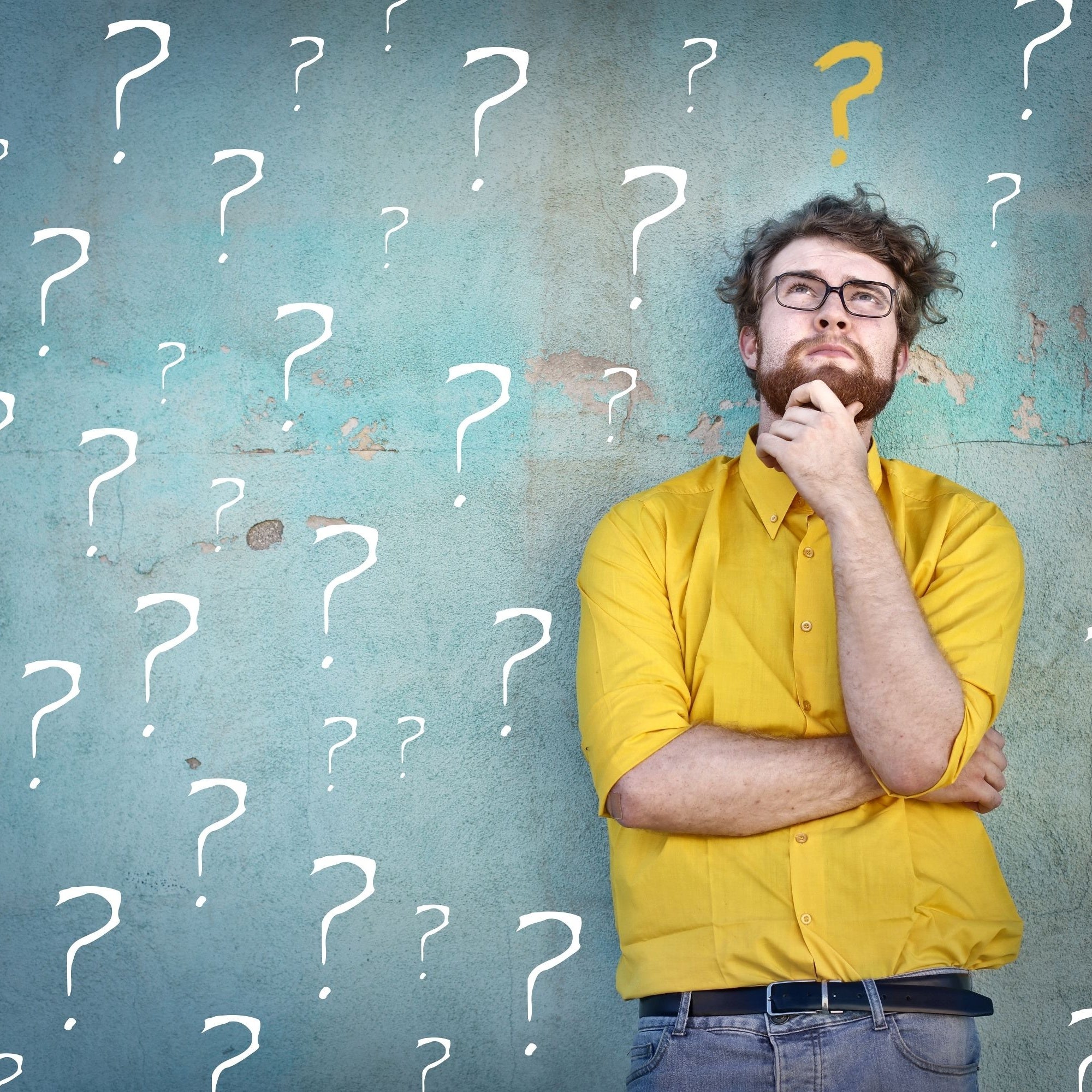 Man with question marks