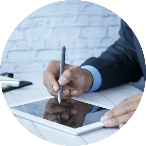 Man writing on tablet