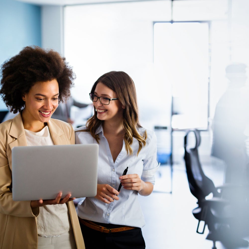 two women and a laptop