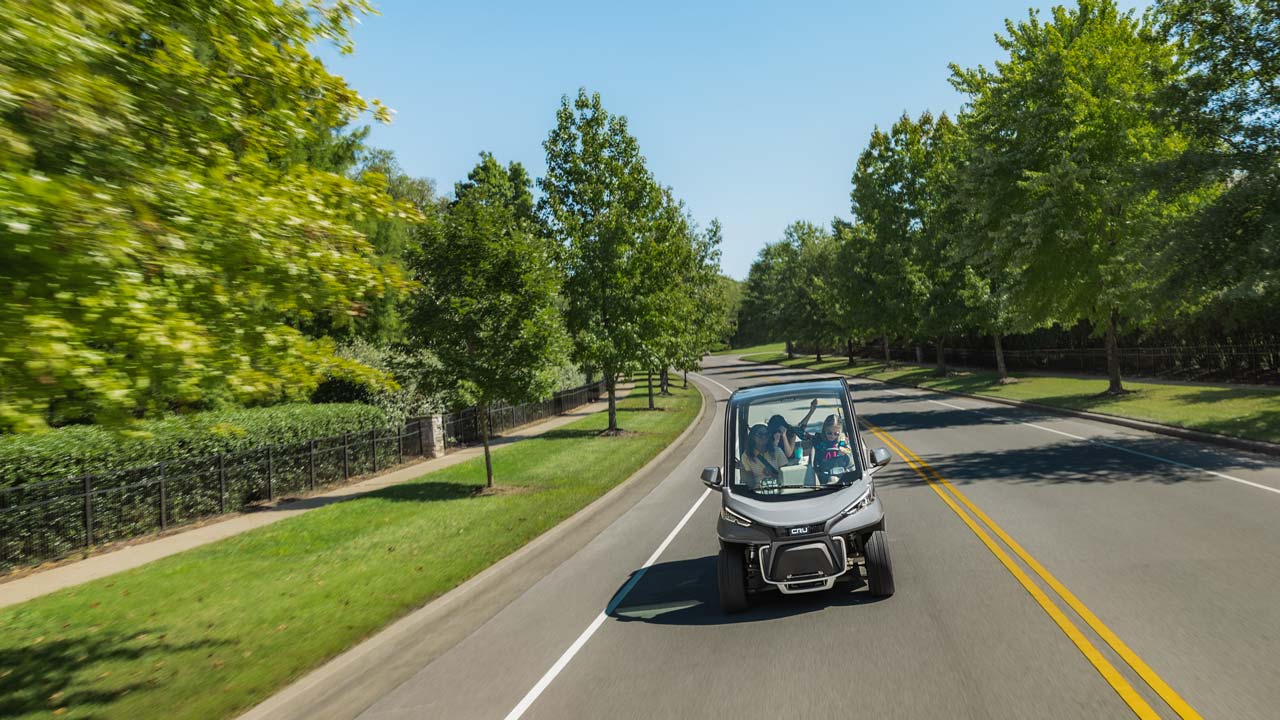 Club Car CRU street-legal NEV on road