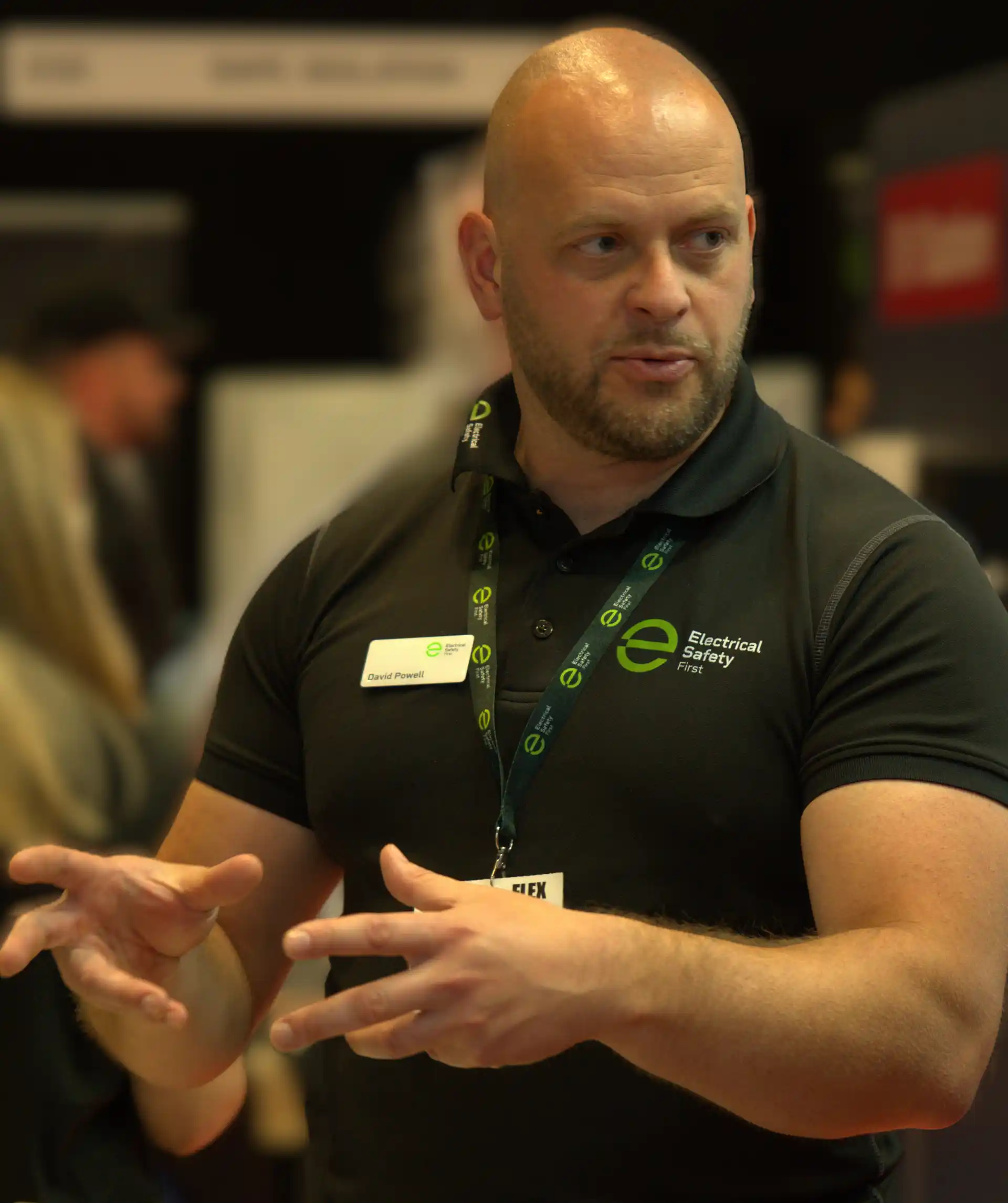 candid photo of a man wearing dark green